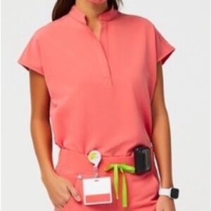 New Figs Women’s Rafaela Collar Scrub Top in color Hot Coral